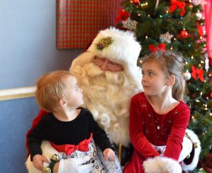 Children talk to Santa Claus 